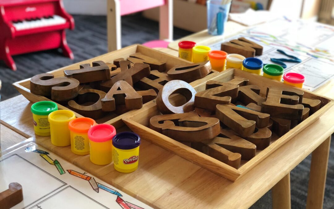 letters and paint at a preschool